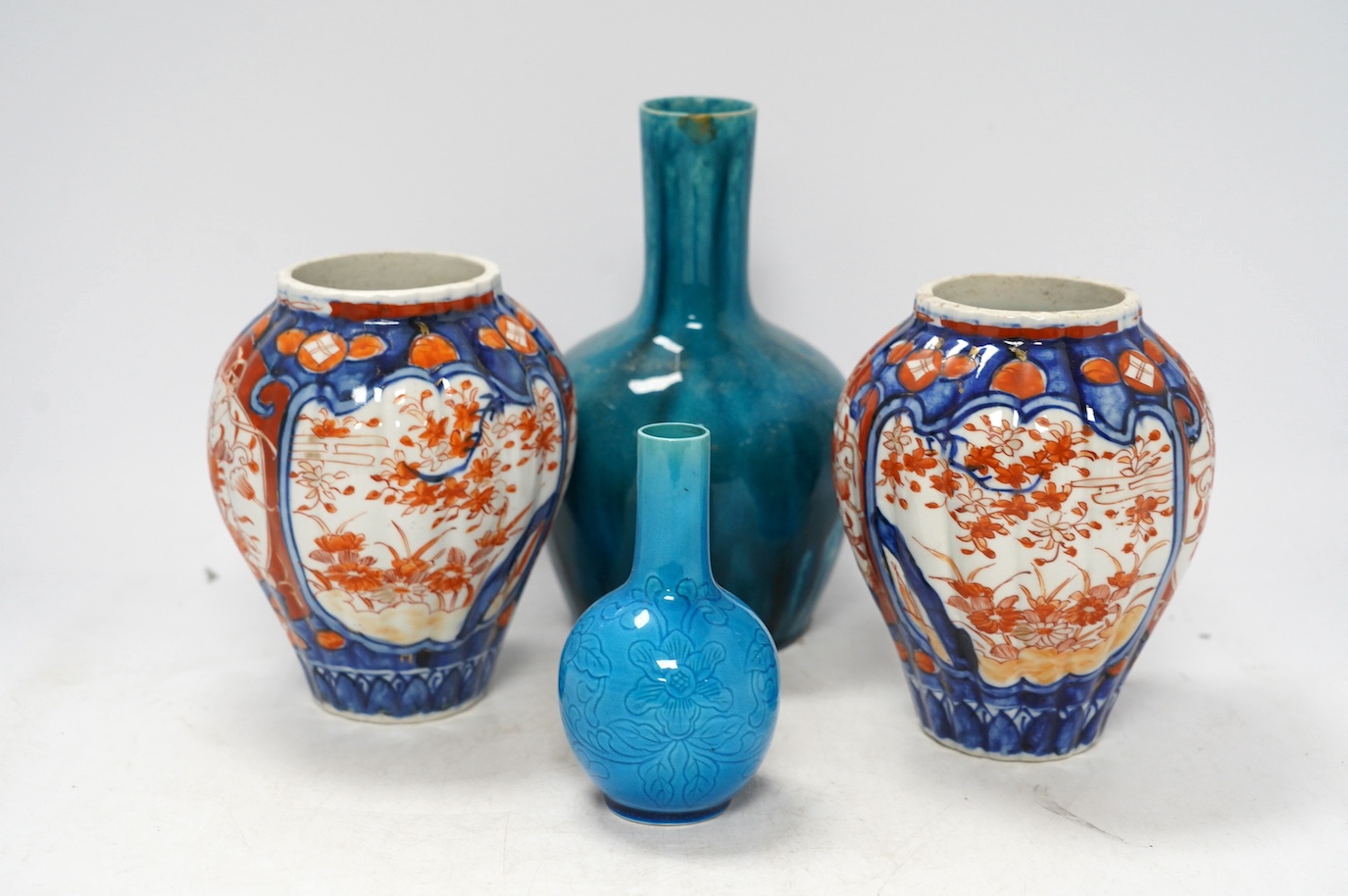 Two Japanese turquoise glazed vases and two Imari vases, tallest 21cm high (4). Condition - turquoise vases good, a chip to top edge of one Imari vase